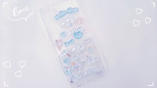 ボンボンドロップシールをスマホケースに黙々とぺたぺた。