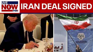 NEW VIDEO: Trump signs US-Iran agreement while in France 