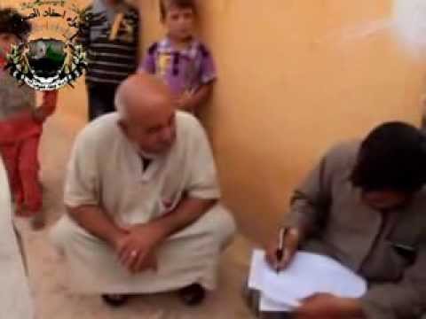 توزيع المعونات للعائلات المقيمة في المدارس من قبل الفرقة 77 في ريف حلب