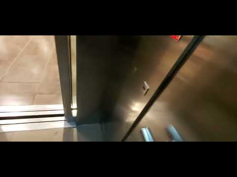 Almost caught! ThyssenKrupp Latitude lift at Zara, Băneasa Shopping City in Bucharest, Romania