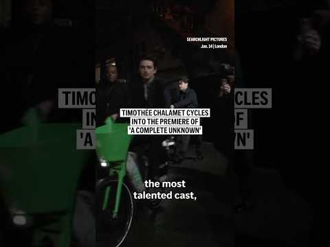 Timothée Chalamet cycles into the premiere of 'A Complete Unknown'