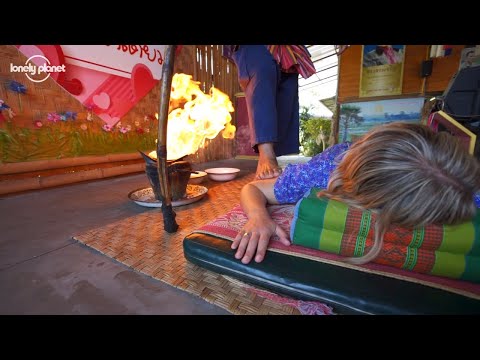 この魔法のようなタイの火のマッサージは、あなたの心と体を照らします。 (This magical Thai fire massage will light up your body and mind)