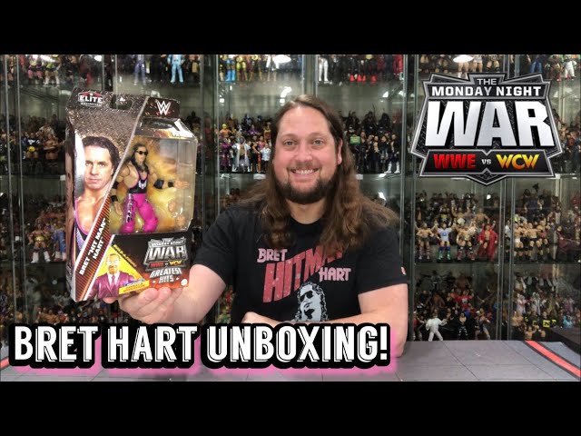 Vídeo relacionado con Morphsuits Disfraz WWE Bret Hart Hitman Hombre Lucha Libre Mono Rosa Sin Mangas Cintas Brazos Gafas Sol Peluca Talla L