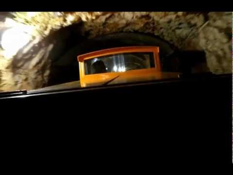 Train ride inside The Postonja Caves