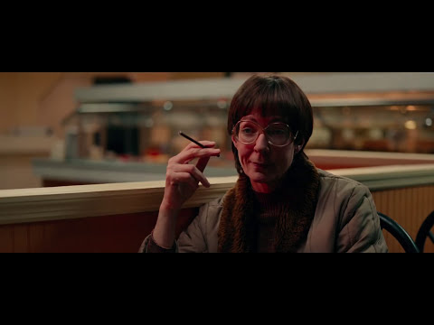 Trailer frame: Tonya exhaling in slow motion, boards and audience blurred