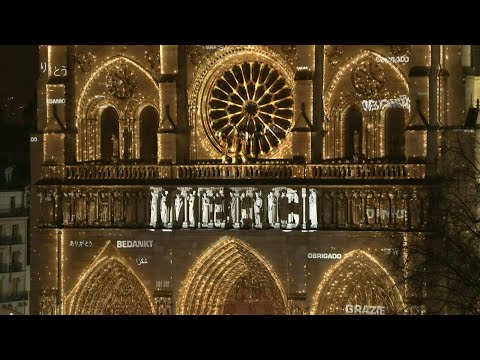 'Thank you' projected onto Notre-Dame during the reopening ceremony | AFP