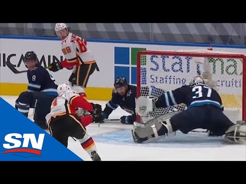 Jets Turn Puck Over Behind Their Net To Gift Flames A Goal