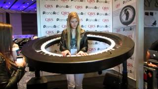 Girl trys to play gnarly 360 degree circular piano at NAMM 2014