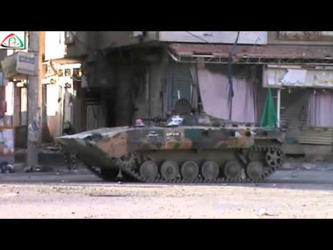 استهداف تحصينات قوات النظام في دير الزور بواسطة  مدفع عربة بي ام بي من قبل لواء ذو النورين