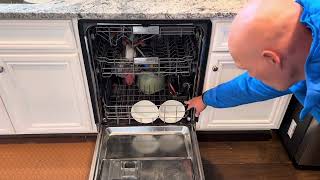 How to fix my dishwasher door. (KitchenAid dishwasher door spring repair)