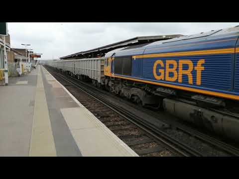 66728 passing Three Bridges on Newhaven Marine-Woking Dn. Yard aggregates 4/5/22