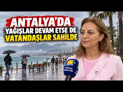 Antalya'da yağışlar devam etse de vatandaşlar sahilde