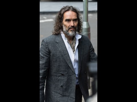 Russell Brand arrives at court for sexual assault trial
