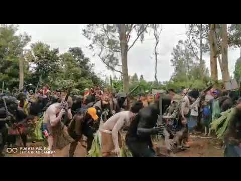 A tribal warfare style funeral in Highland of PNG.