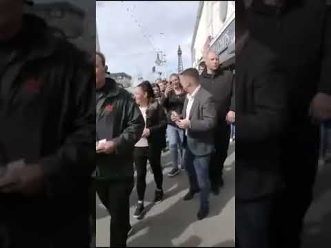 Tommy Robinson MEP campaign in Blackpool Great welcome for TR & Big security guard by his side
