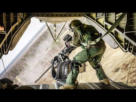 Guner in Action with M2 Cal 50 from the CH 53 King Stallion Helicopter