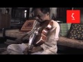 Balamuralikrishna plays violin at home.