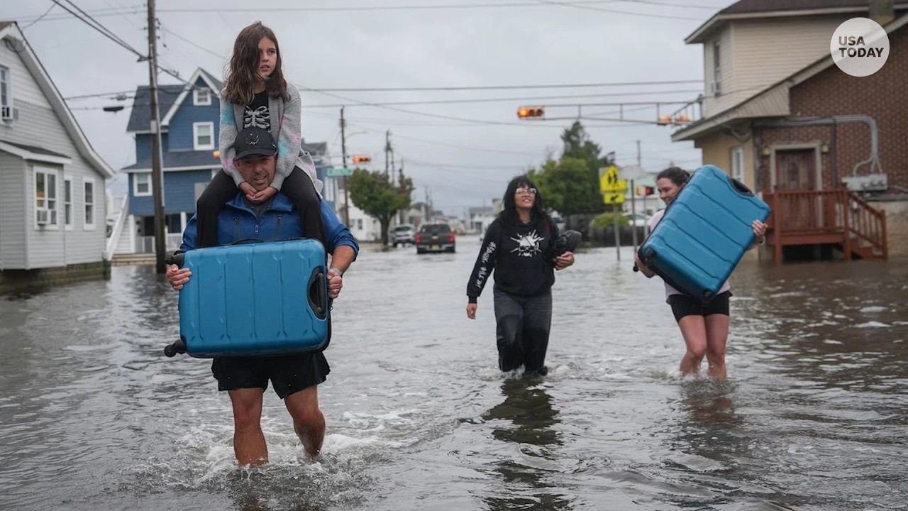 Nor'easter lashes East Coast, floodwaters flow through coastal neighborhoods