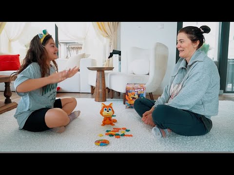 Playing cute cat game with Oyku and her mother