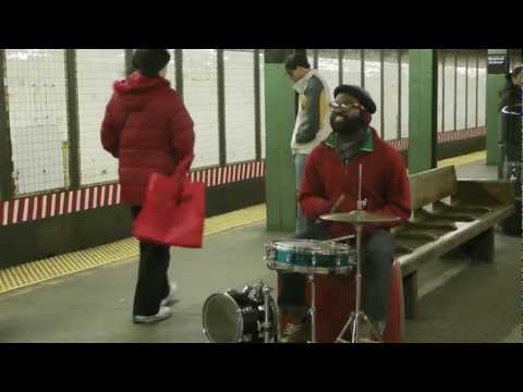 drummer and vocalist "mr. reed" rocks the bedford street L station in brooklyn