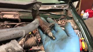 2001 Ford Escape: Replacing the wiper linkage (transmission) and wiper motor.