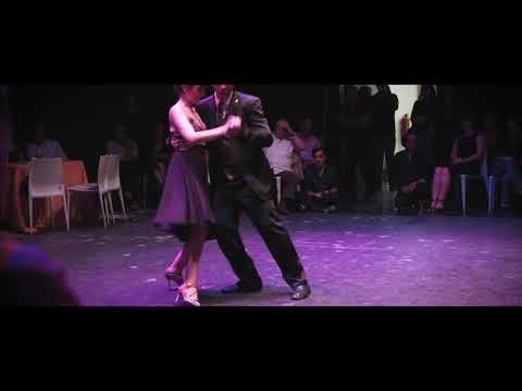  German Salvatierra  and  Victoria Cruz  are  dancing  to  a  milonga