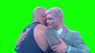 The Rock & Cody Rhodes shake hands and hug green screen