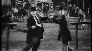 laurel and hardy dancing to torn on the platform