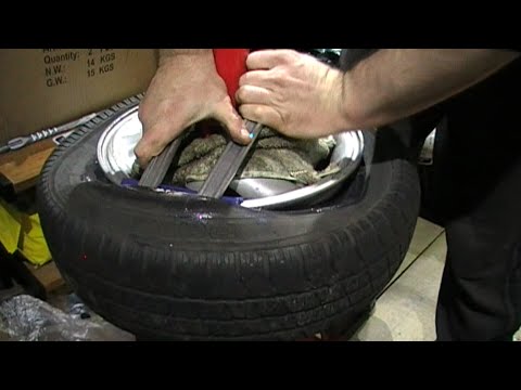 Removing an old car tyre at home without damaging or scratch...