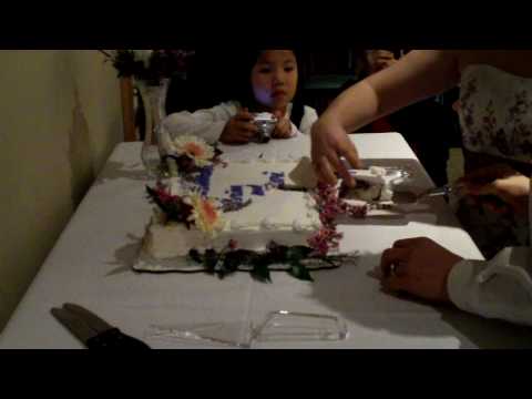 Brian and Naomi Klotz cutting their wedding cake!