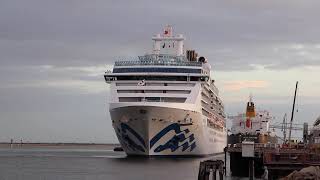 Coral Princess cruise ship, from Princess Cruises, moving into the berth with the help of a tug