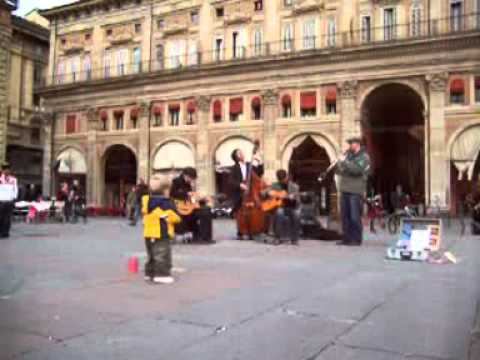 Little baby grooves to gypsy jazz in Bologna, Italy