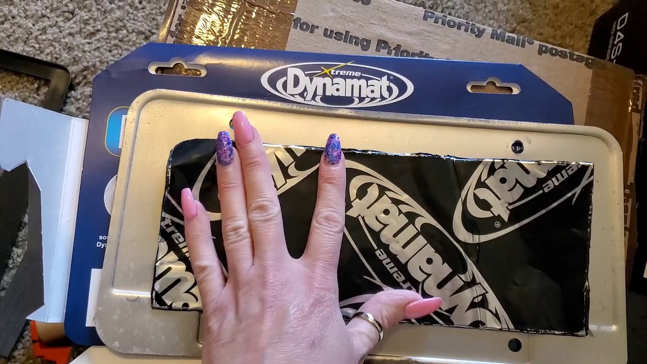 Installing Dynamat license plate kit.