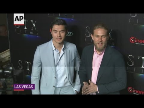 British actors Henry Golding and Charlie Hunnam promote new Guy Ritchie film "The Gentlemen" at CinemaCon in Sin City. (April 4)