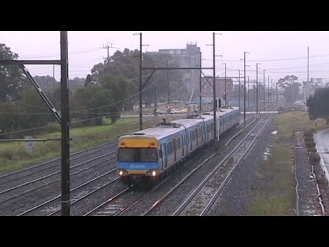 Trains in the rain at Sunshine 3/3/12