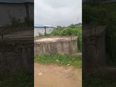 Half Plot Fenced with Shops for Sale at Bucknor Estate