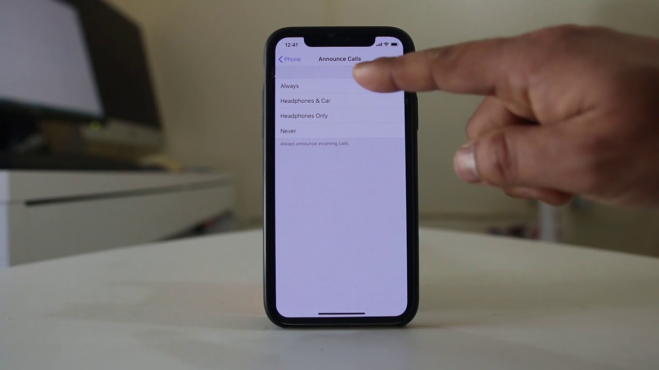 How do I get my iPhone to tell me who is calling?