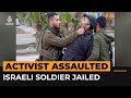 Israeli soldier assaults Palestinian activist in full view of camera | Al Jazeera Newsfeed