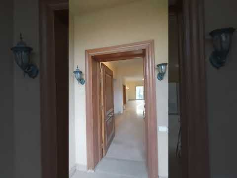 Villa exclusiva en Katameya Heights con vistas al golf