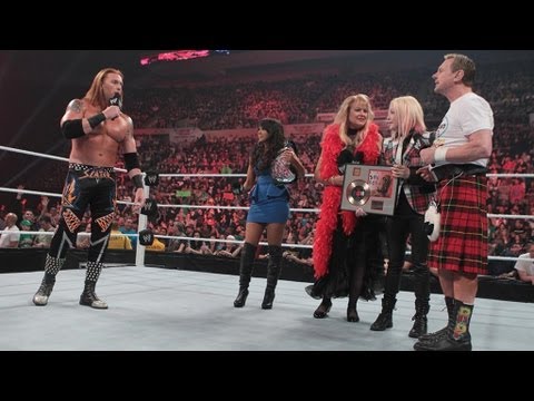 Cyndi Lauper bashes Heath Slater over the head with a record