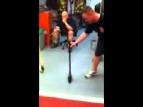 Balancing a broom at work with the earths gravity