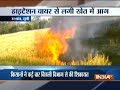 UP: Short circuit in high tension wire turns crop field into ashes in Unnao