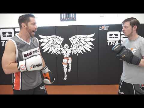 Parrying and Countering Straight Shots From Open Stance With Body Kicks