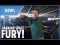 Woman STANDS in parking space to reserve a spot