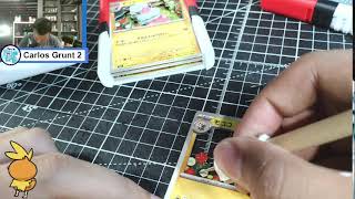 Cutting Pokemon cards psyduck edition