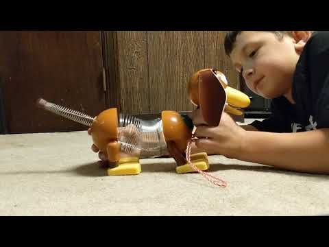 Retro Slinky Dog, The Original Walking Spring Toy, Vintage Spring Toys, Stretches to 14 Inches Long, Kids Toys for Ages 18 Month by Just Play - Watch Product Video