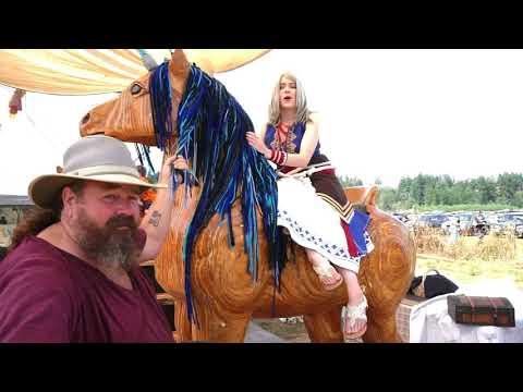 A lovely young lady riding sidesaddle.