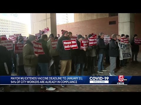 Chants of 'Let us work' erupt as mayor extends vaccine mandate
