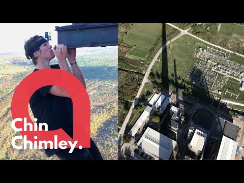 Brit climbs one of the tallest power stations in Europe - and even does CHIN-UPS on the side | SWNS