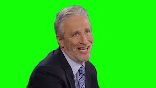 Jon Stewart turns and makes dumb face green screen